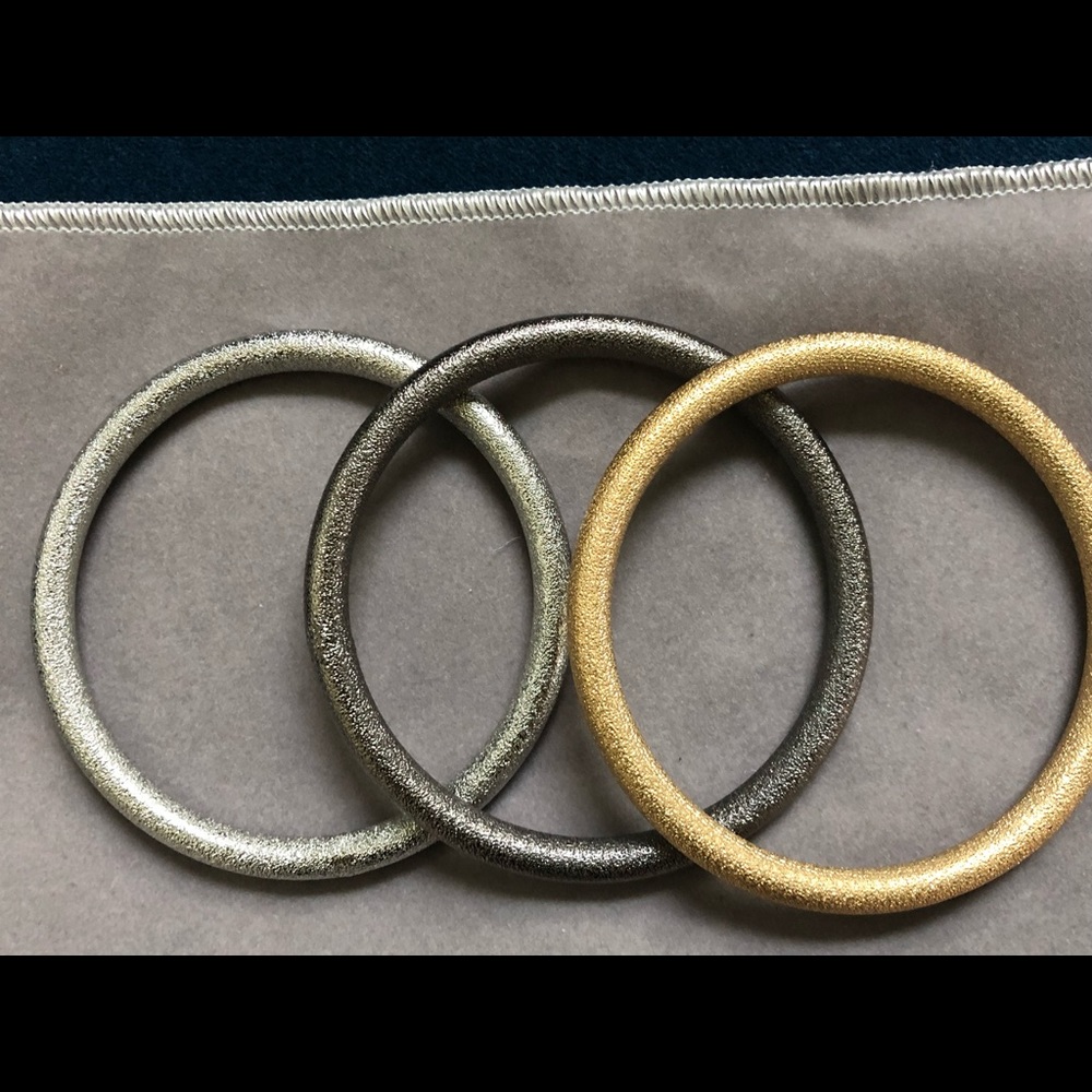 Lia Sophia triple set of bracelets.